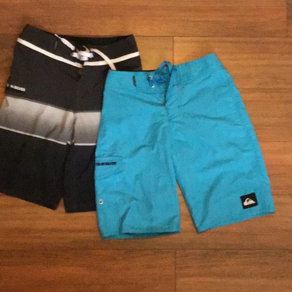 Two pair Quicksilver swim shorts.